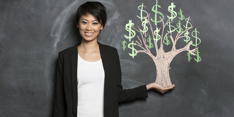 woman and chalk money tree drawing on blackboard