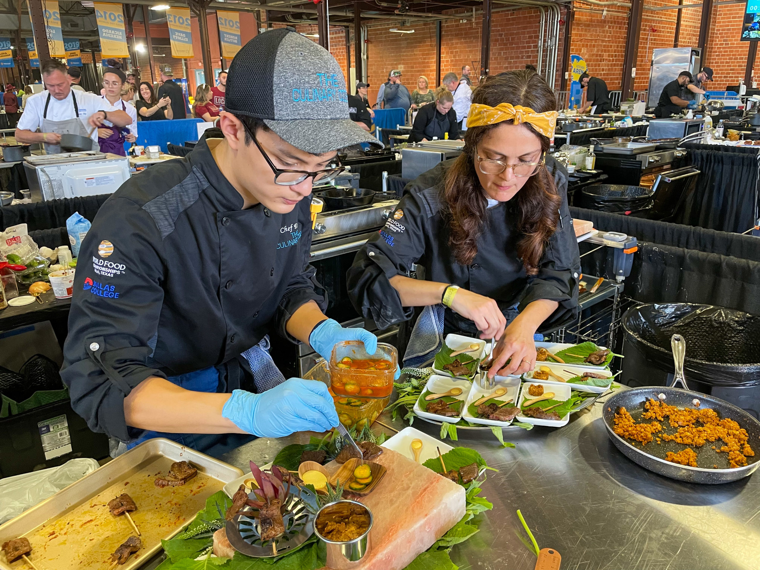 photo of Preston Nguyen and Emma Nguyen plating at the World Food Championships
