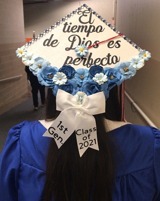 Graduation cap decorated as first-generation graduate.